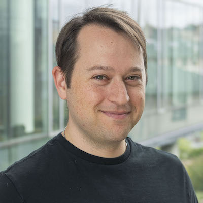 Yonatan Bisk (white male wearing a black t-shirt against a white background)